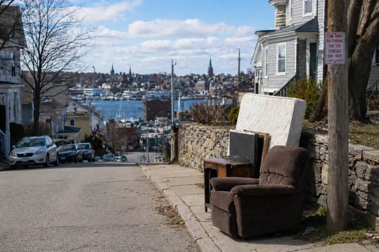 Furniture placed on curb for bulk trash pickup in New Bedford neighborhood